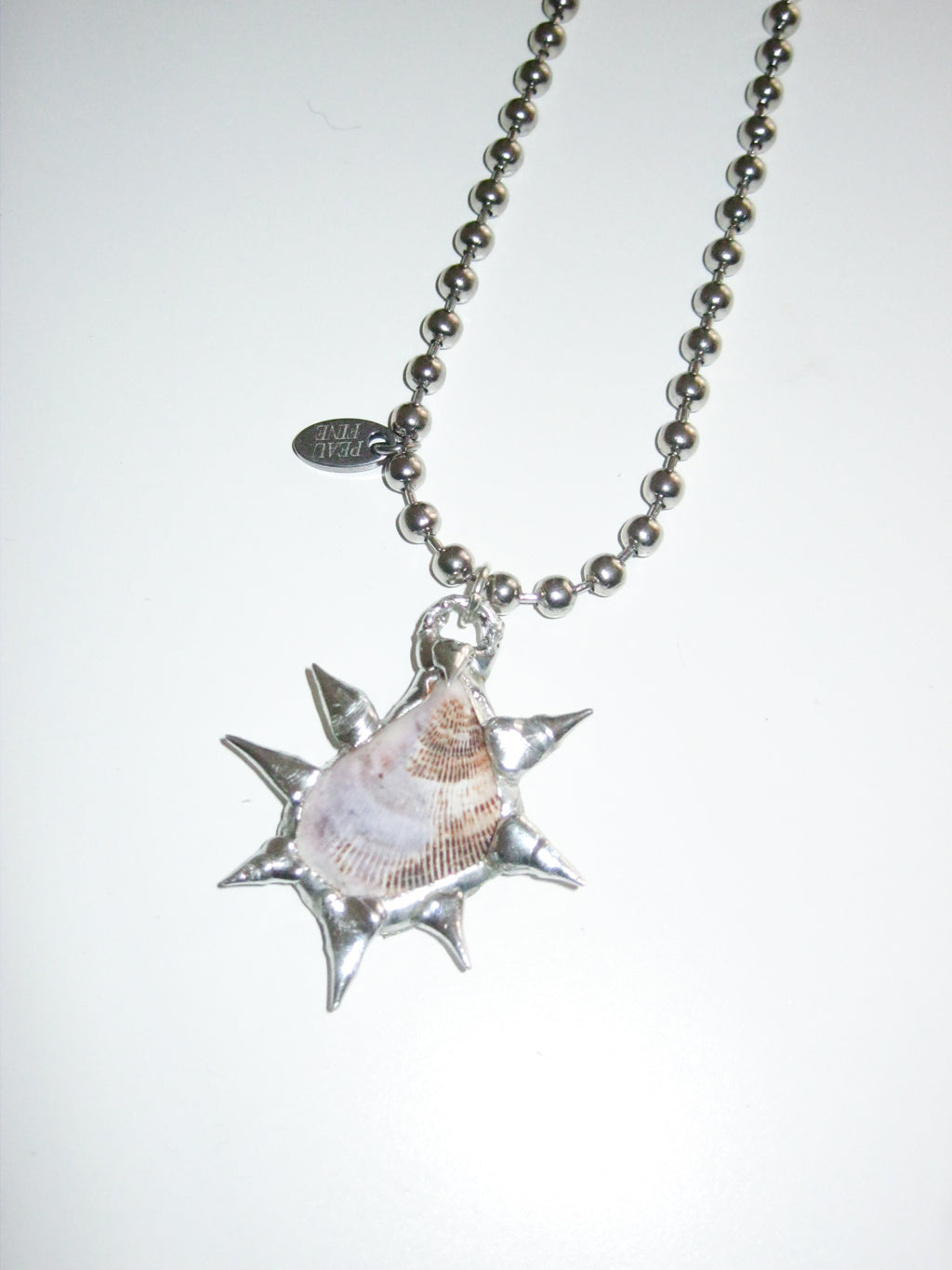 Spiky Shell pendant