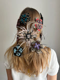Ever-blooming feather brooch & hair clip